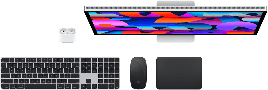 Vista superior de unos AirPods, un Studio Display, un Magic Keyboard, un Magic Mouse y un Magic Trackpad.